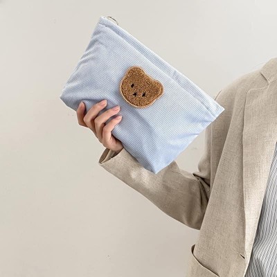 Túi đựng mỹ phẩm cầm tay màu sắc kẹo ngọt