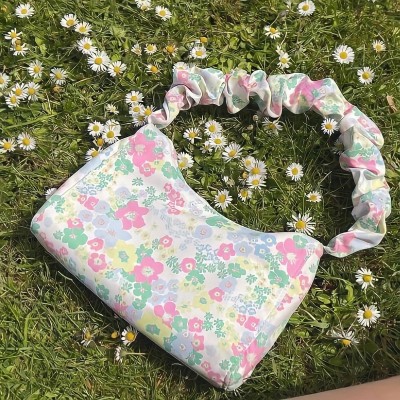 Túi đeo quai xoắn hình bông hoa