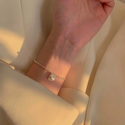 Vòng tay trái tim bạc