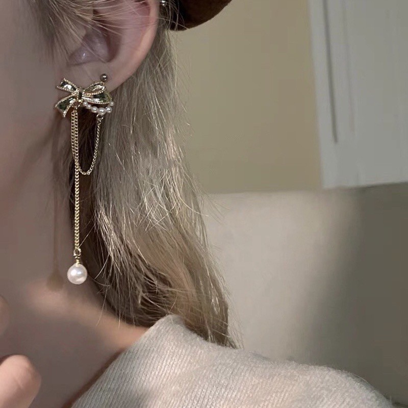 Khuyên tai dáng dài đính ngọc trai phối nơ lấp lánh 