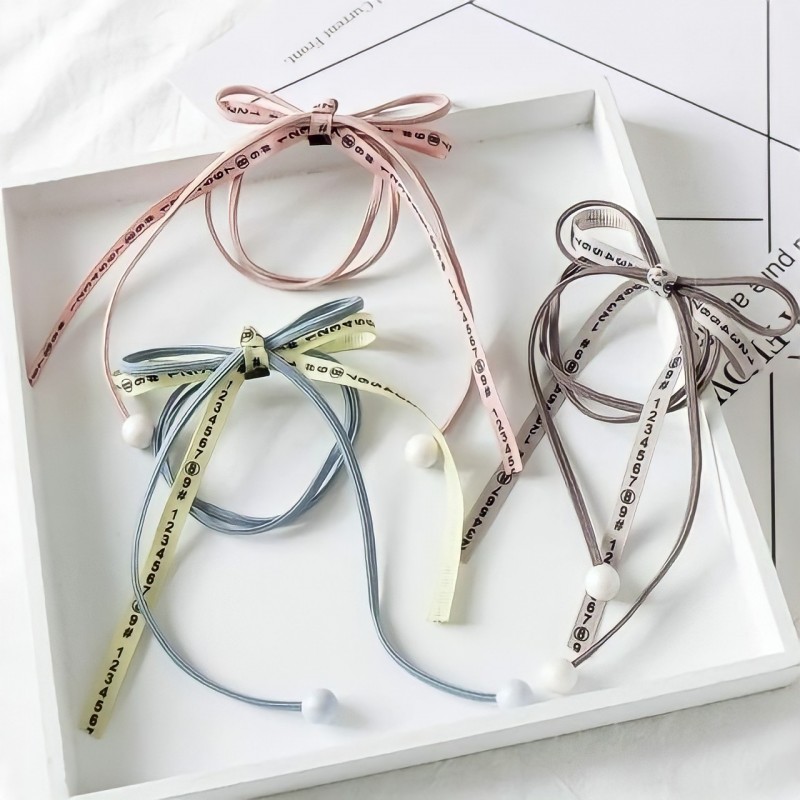 Buộc tóc thắt nơ dài