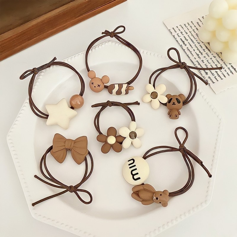 Buộc tóc dạng charm