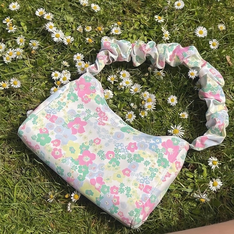 Túi đeo quai xoắn hình bông hoa