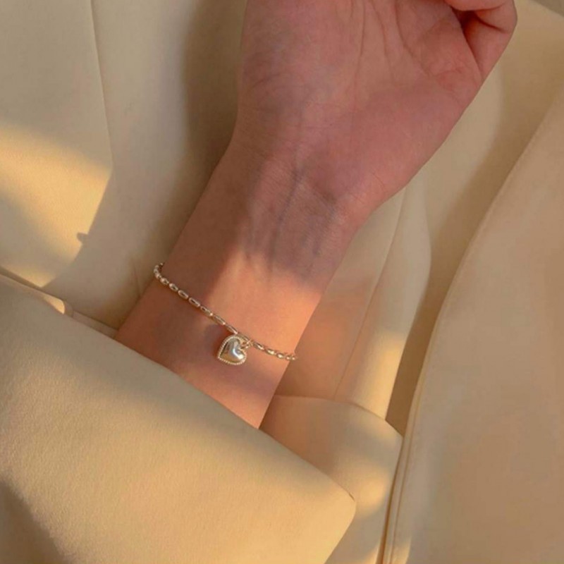 Vòng tay trái tim bạc